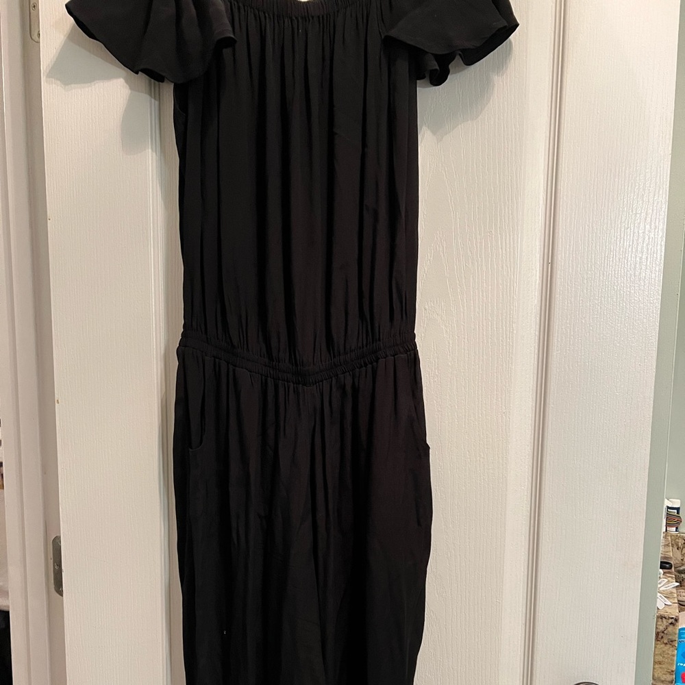 Beautiful romper, can be worn off shoulder if desired.  Dress up or down.